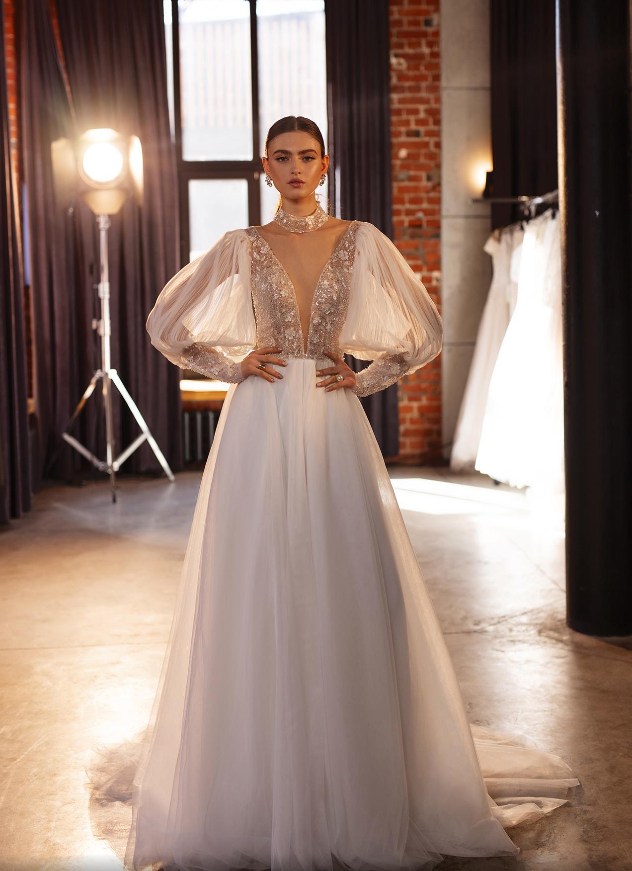 Нежное свадебное платье с объемными рукавами фото