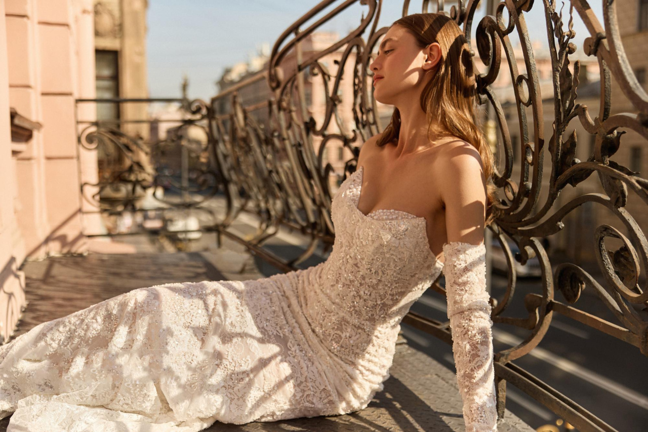 Кружевное свадебное платье рыбка с рукавами фото