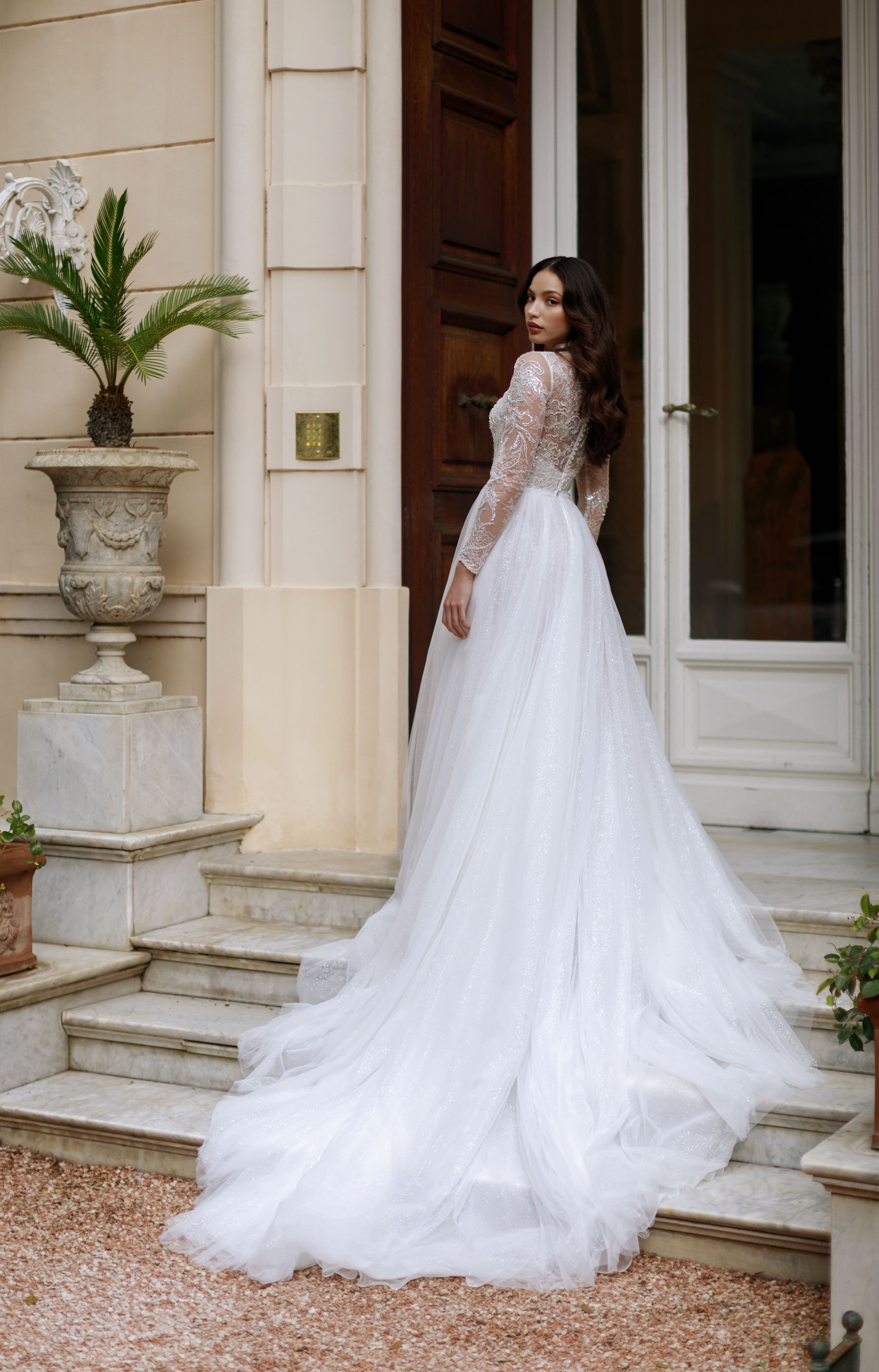 Закрытое свадебное платье с рукавами фото