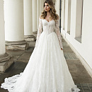 Кружевное свадебное платье с рукавами и открытыми плечами фото