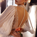 Нежное свадебное платье с объемными рукавами фото