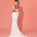 Сильное свадебное платье с американской промой с декором из жемчуга фото