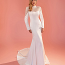 Красивое свадебное платье с роскошной вышивкой из жемчуга фото