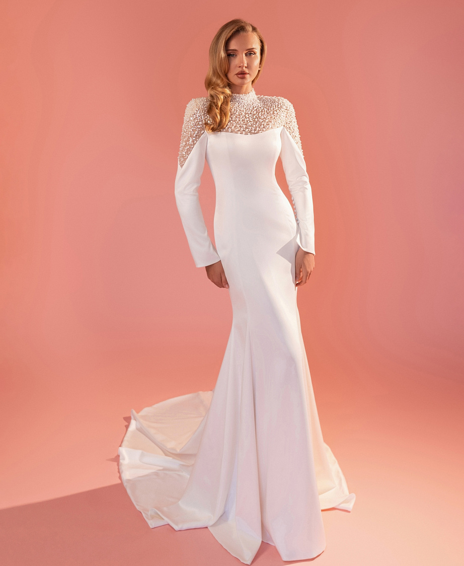 Красивое свадебное платье с роскошной вышивкой из жемчуга фото