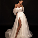 Блестящее свадебное платье с открытыми плечами фото