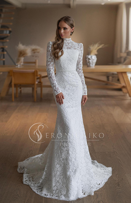 Закрытое кружевное свадебное платье с рукавчиками фото