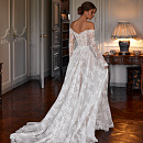 Кружевное свадебное платье с рукавами и шлейфом фото