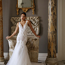 Кружевное свадебное платье со съемными крыльями фото