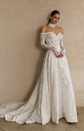 Роскошное кружевное свадебное платье с рукавами и открытыми плечами фото