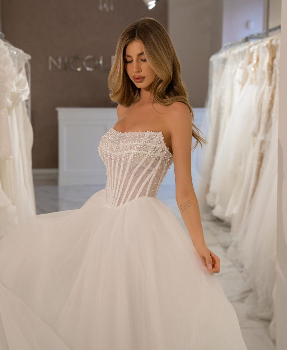 Свадебное платье расшитое жемчужинами фото