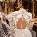 Закрытое свадебное платье в хлопковом кружеве фото