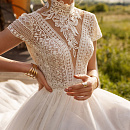 Закрытое свадебное платье в стиле бохо фото